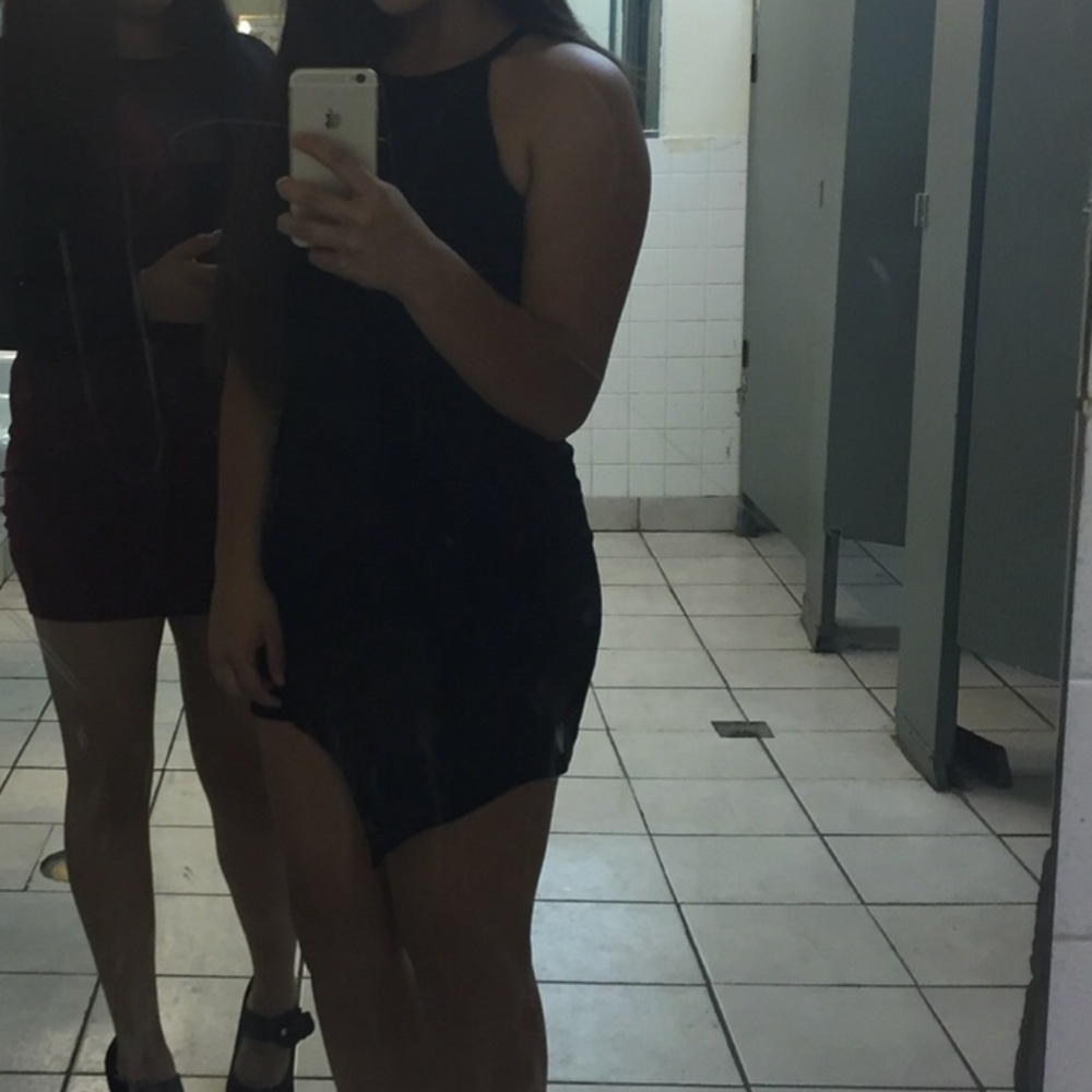 Black, tight fitting dress